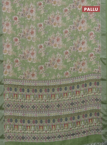 Linen cotton saree green with floral prints & sequin work and silver zari woven border
