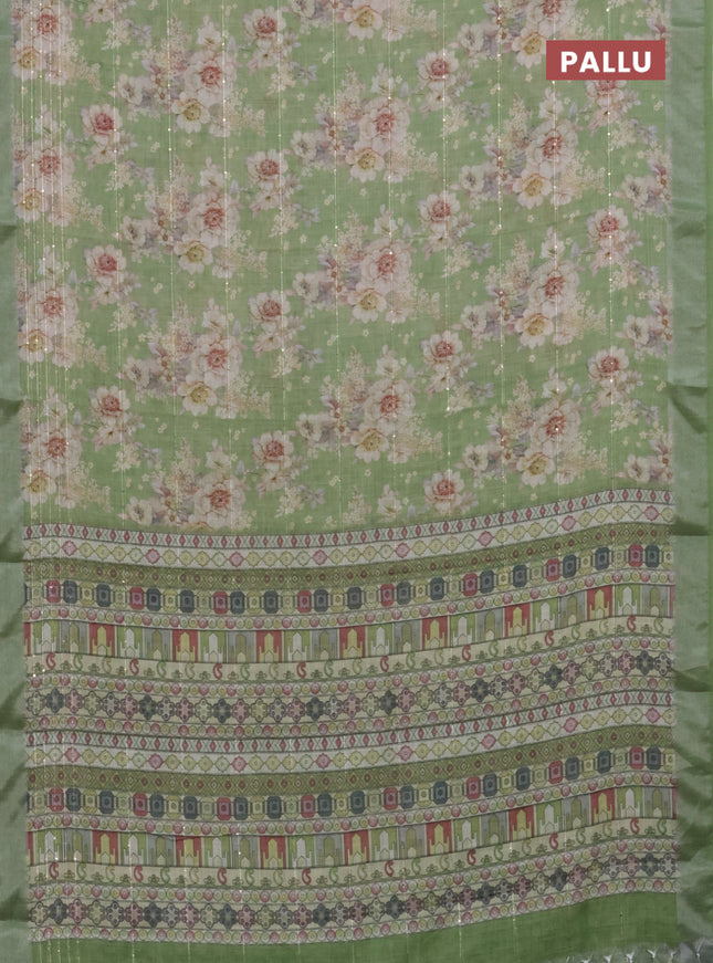 Linen cotton saree green with floral prints & sequin work and silver zari woven border