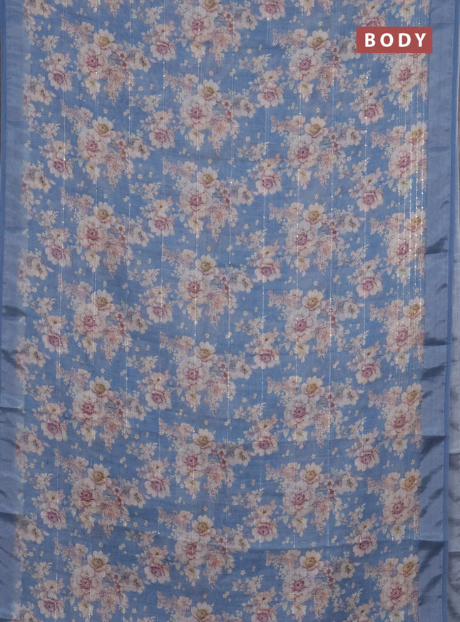 Linen cotton saree pastel blue with floral prints & sequin work and silver zari woven border