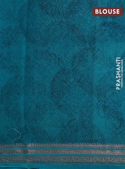 Chanderi silk cotton saree teal blue and teal green with allover prints and banarasi style border