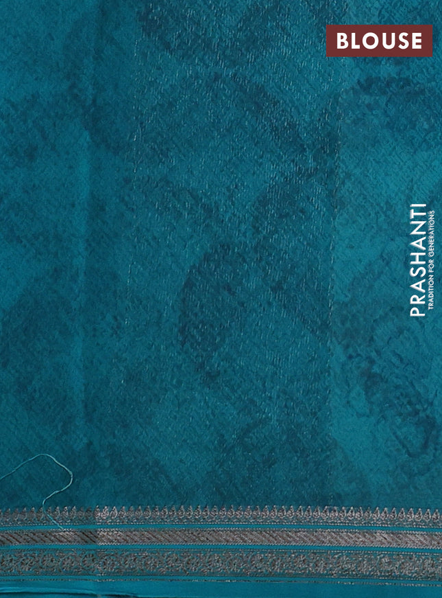 Chanderi silk cotton saree teal blue and teal green with allover prints and banarasi style border
