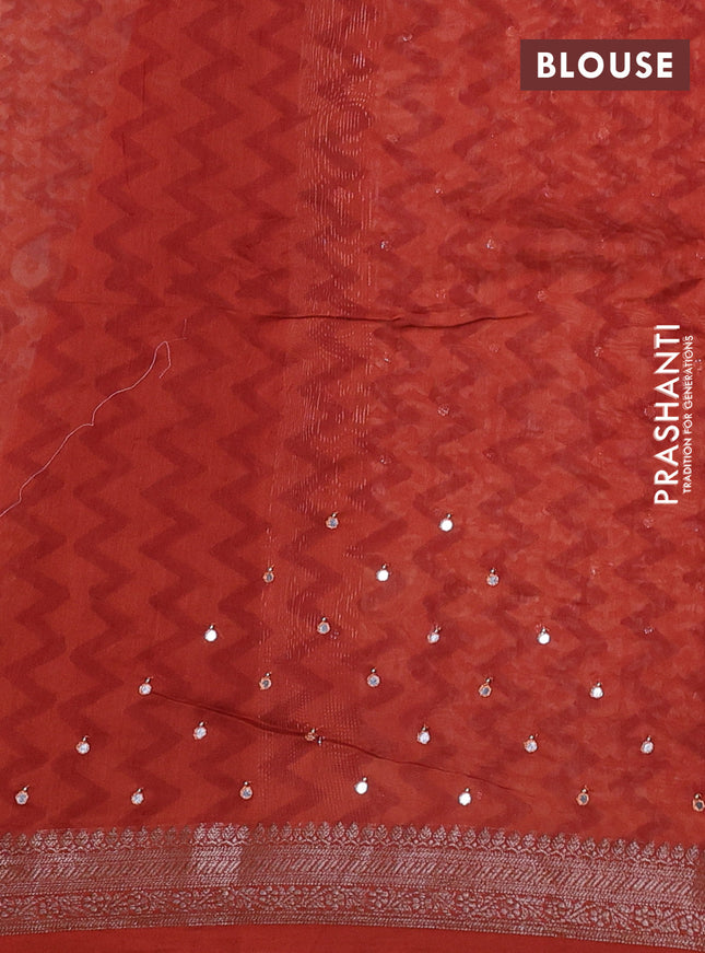 Chanderi silk cotton saree pale orange and orange with allover prints & mirror work and woven border