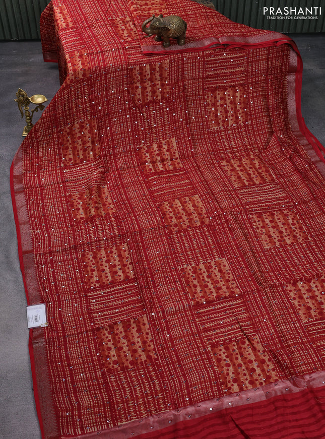 Chanderi silk cotton saree rustic orange and red with allover geometric prints & mirror work and woven border