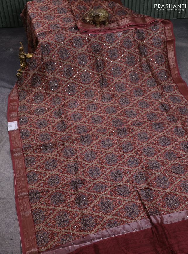 Chanderi silk cotton saree pastel maroon with allover prints & mirror work and woven border