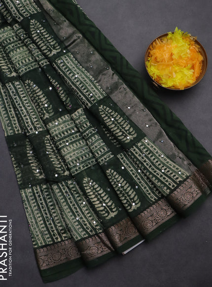 Chanderi silk cotton saree green with allover prints & mirror work and woven border