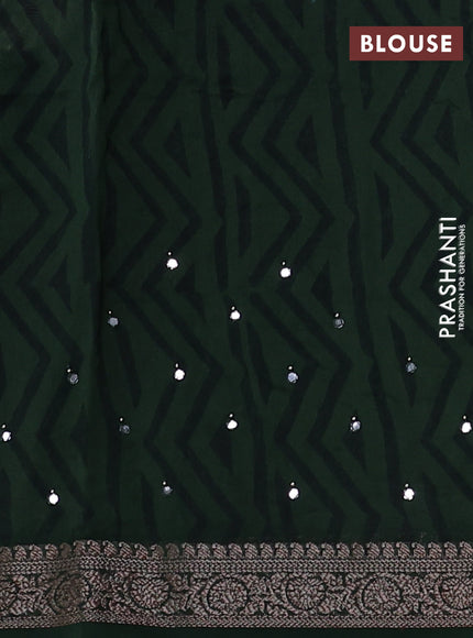 Chanderi silk cotton saree green with allover prints & mirror work and woven border