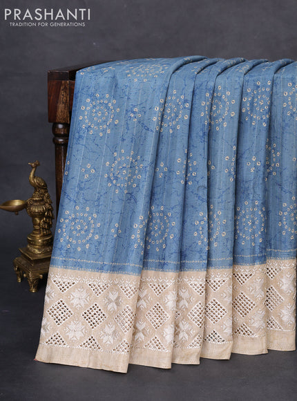Semi tussar saree blue shade and beige with allover bandhani prints and embroidery cut work border
