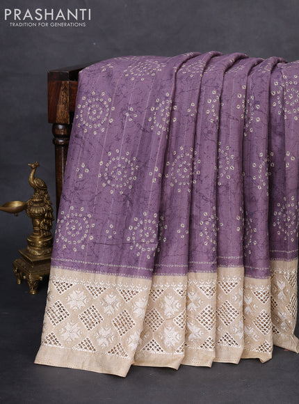 Semi tussar saree violet shade and beige with allover bandhani prints and embroidery cut work border