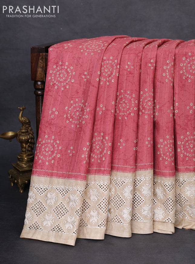 Semi tussar saree peach pink and beige with allover bandhani prints and embroidery cut work border