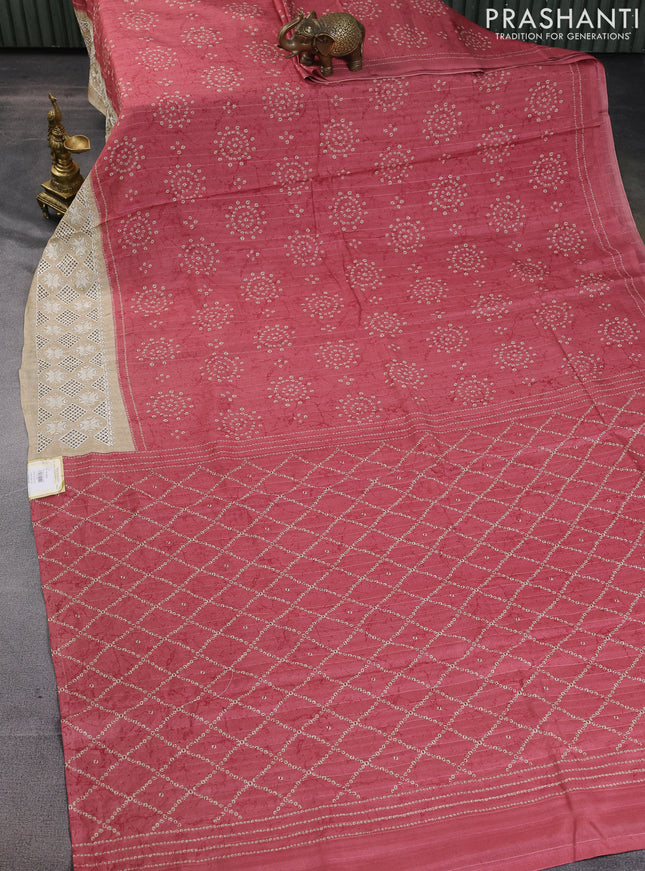 Semi tussar saree peach pink and beige with allover bandhani prints and embroidery cut work border