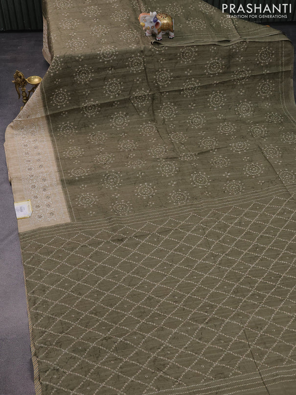 Semi tussar saree sap green shade and beige with allover bandhani prints and embroidery cut work border