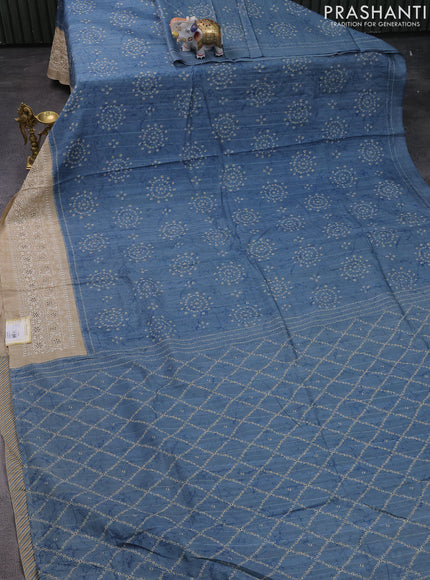 Semi tussar saree pastel blue and beige with allover bandhani prints and embroidery cut work border