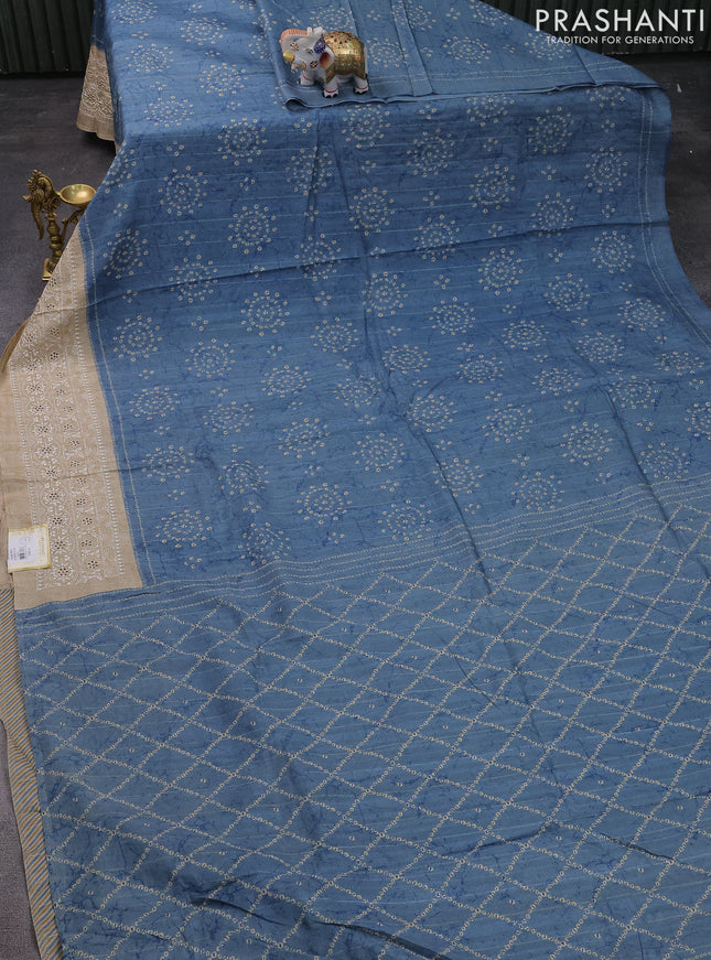 Semi tussar saree pastel blue and beige with allover bandhani prints and embroidery cut work border