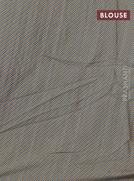 Semi tussar saree pastel blue and beige with allover bandhani prints and embroidery cut work border