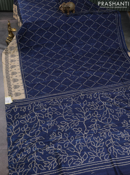 Semi tussar saree peacock blue and beige with allover bandhani prints and embroidery work border