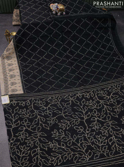 Semi tussar saree black and beige with allover bandhani prints and embroidery work border