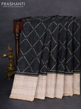 Semi tussar saree black and beige with allover bandhani prints and embroidery cut work border