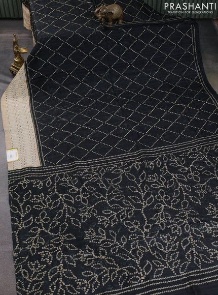 Semi tussar saree black and beige with allover bandhani prints and embroidery cut work border