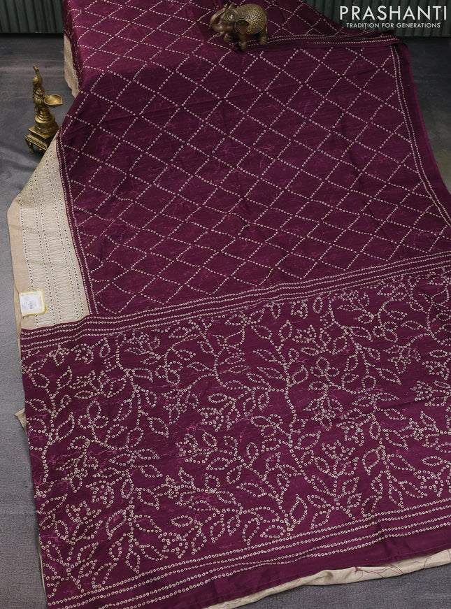 Semi tussar saree wine shade and beige with allover bandhani prints and embroidery cut work border