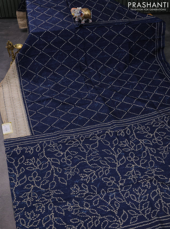 Semi tussar saree peacock blue and beige with allover bandhani prints and embroidery cut work border