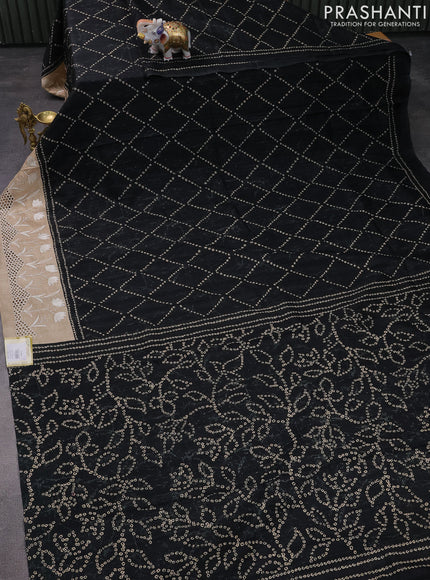 Semi tussar saree black and beige with allover bandhani prints and embroidery cut work border