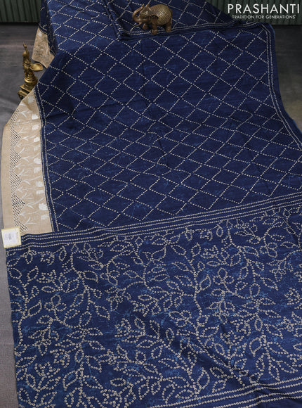 Semi tussar saree peacock blue and beige with allover bandhani prints and embroidery cut work border