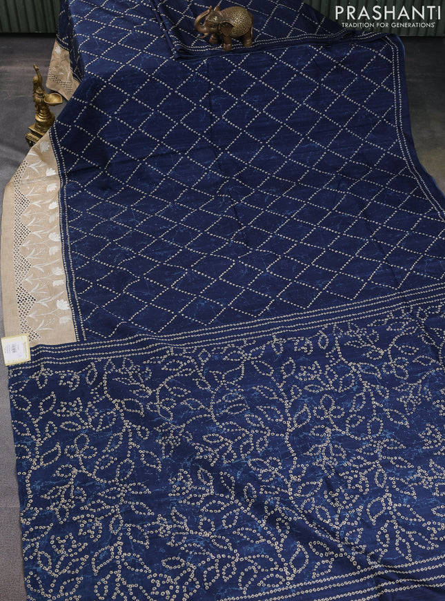 Semi tussar saree peacock blue and beige with allover bandhani prints and embroidery cut work border