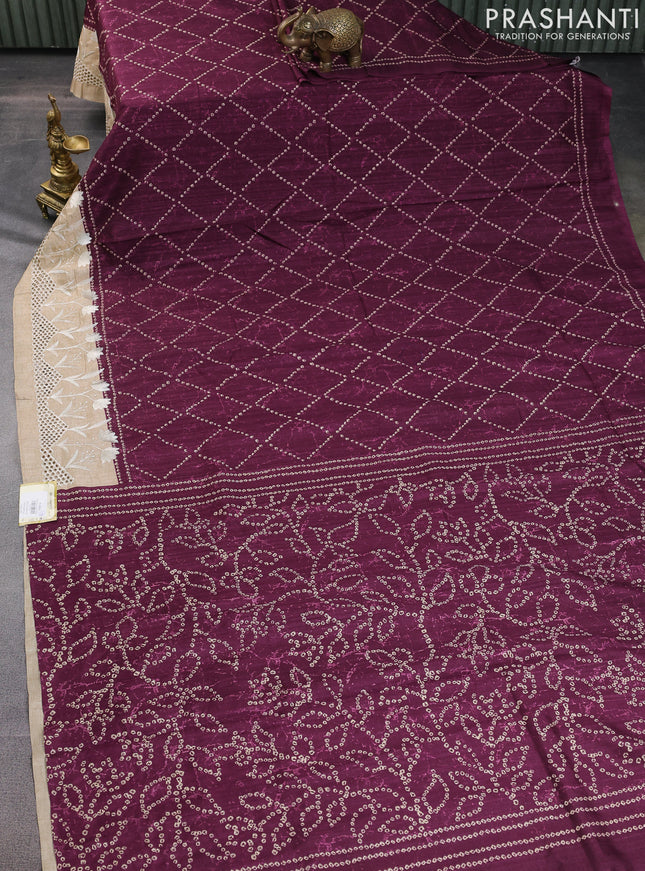Semi tussar saree wine shade and beige with allover bandhani prints and embroidery cut work border