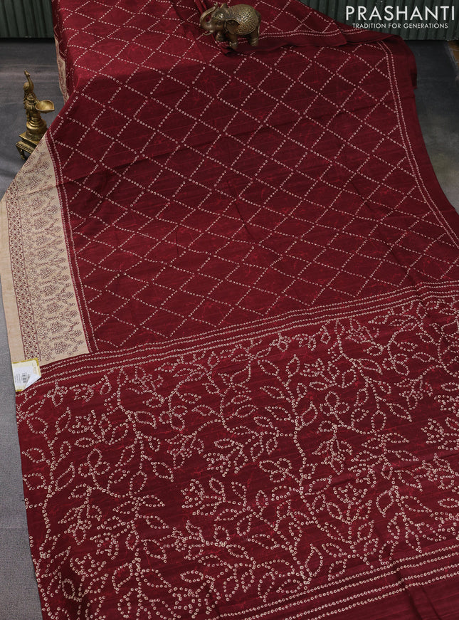 Semi tussar saree amaroon and beige with allover bandhani prints and embroidery work border