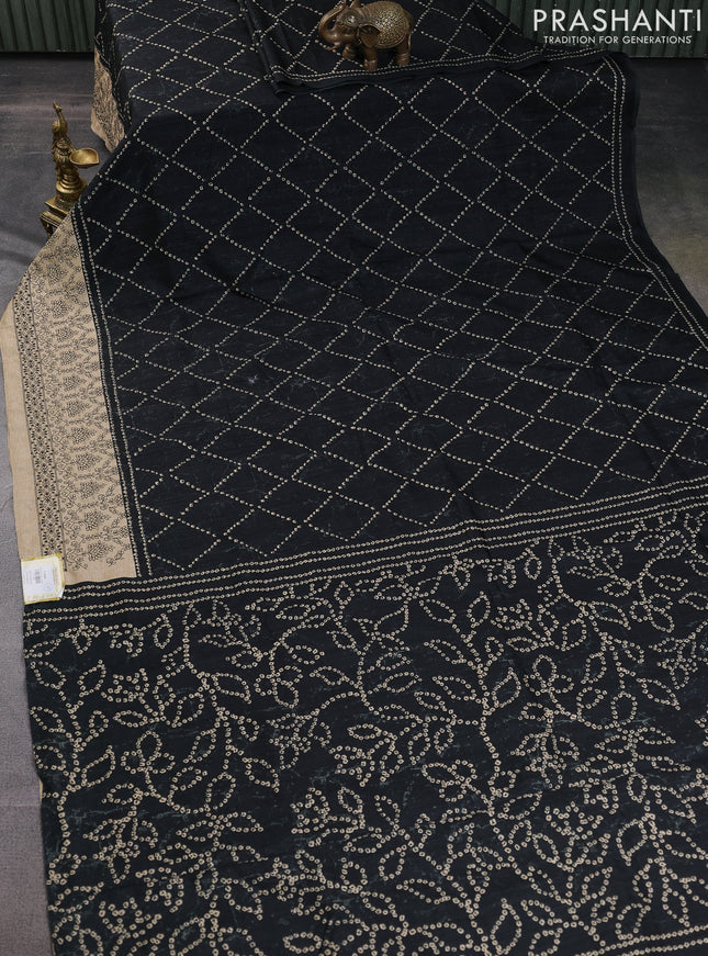 Semi tussar saree black and beige with allover bandhani prints and embroidery work border