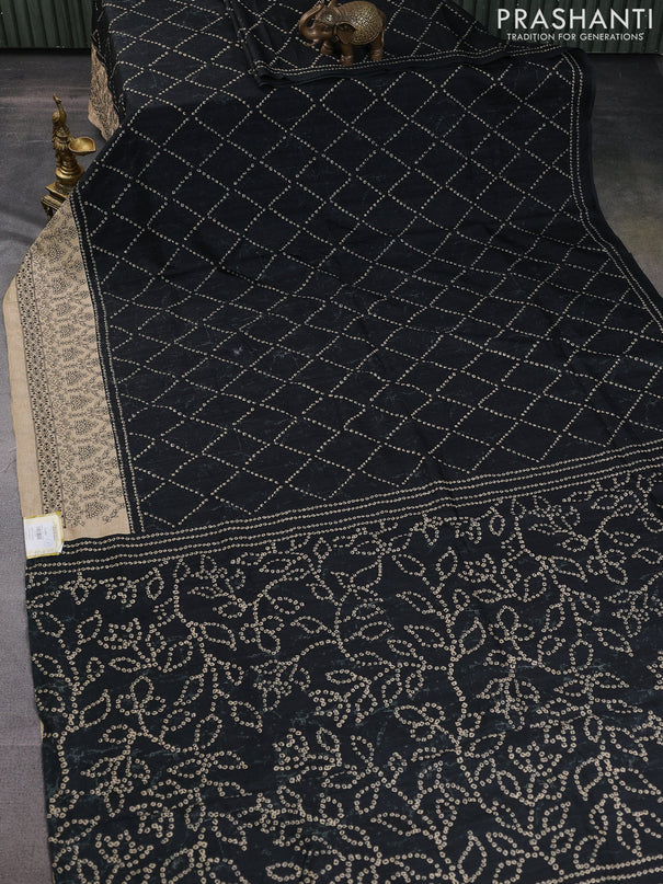 Semi tussar saree black and beige with allover bandhani prints and embroidery work border
