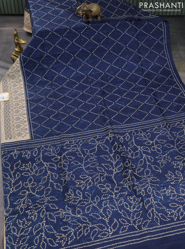Semi tussar saree peacock blue and beige with allover bandhani prints and embroidery work border