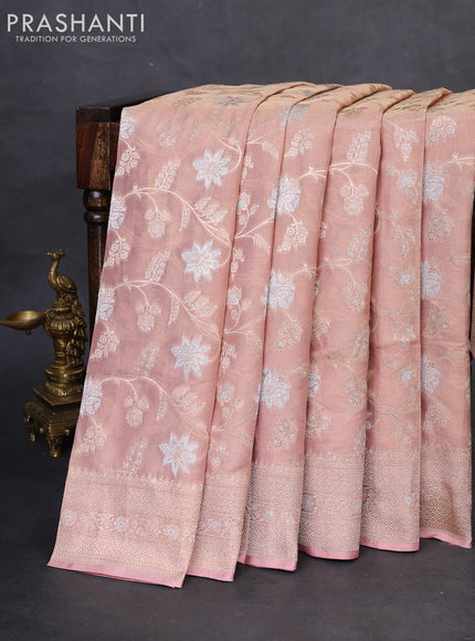 Banarasi tissue silk saree pastel peach with allover thread & zari woven floral weaves and zari woven border