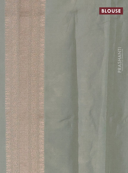 Banarasi tissue silk saree pastel green shade with allover thread & zari woven floral weaves and zari woven border