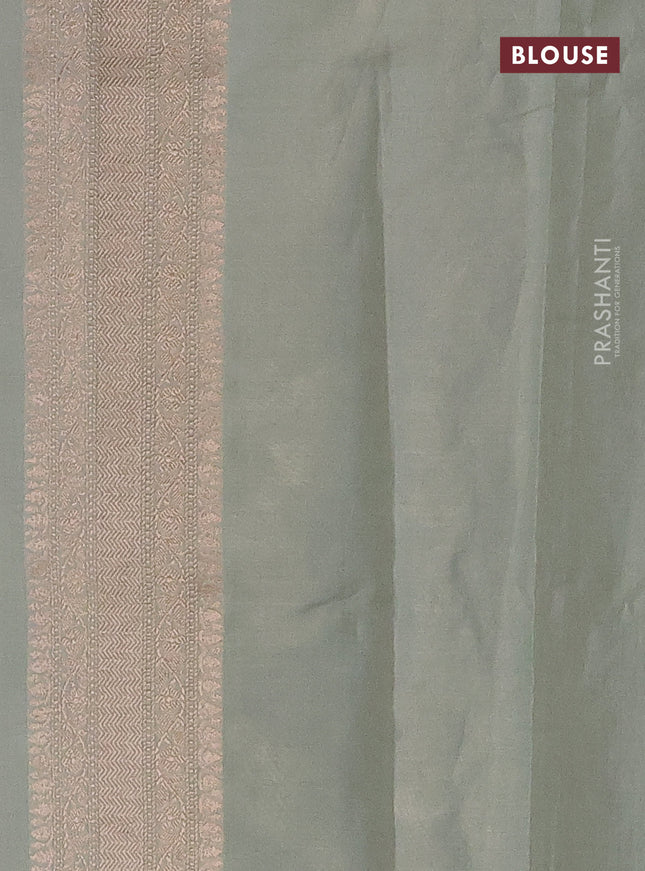 Banarasi tissue silk saree pastel green shade with allover thread & zari woven floral weaves and zari woven border