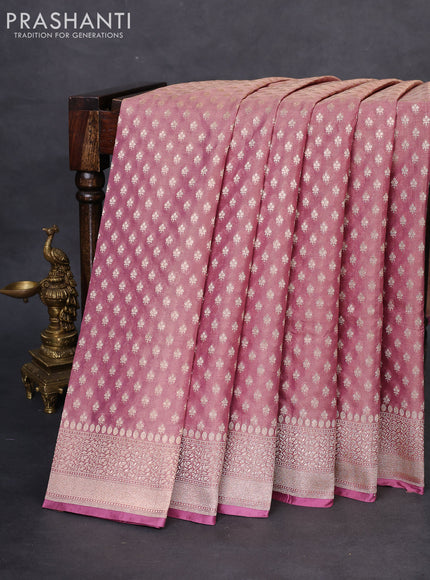 Banarasi tissue silk saree pastel pink with allover zari woven brocade weaves and zari woven border