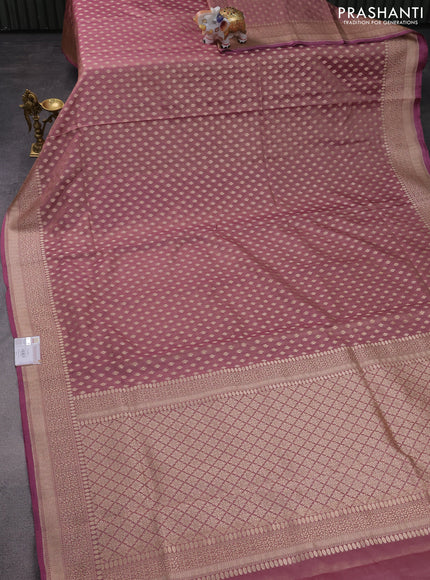 Banarasi tissue silk saree pastel pink with allover zari woven brocade weaves and zari woven border