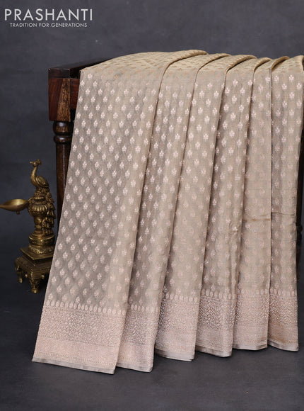 Banarasi tissue silk saree grey shade with allover zari woven brocade weaves and zari woven border