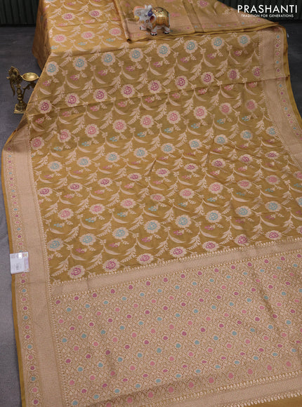 Banarasi tissue silk saree mustard shade with allover thread & zari woven floral weaves and zari woven border
