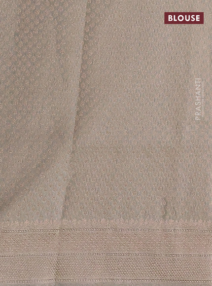 Banarasi tissue silk saree pastel green with allover zari woven brocade weaves and zari woven border