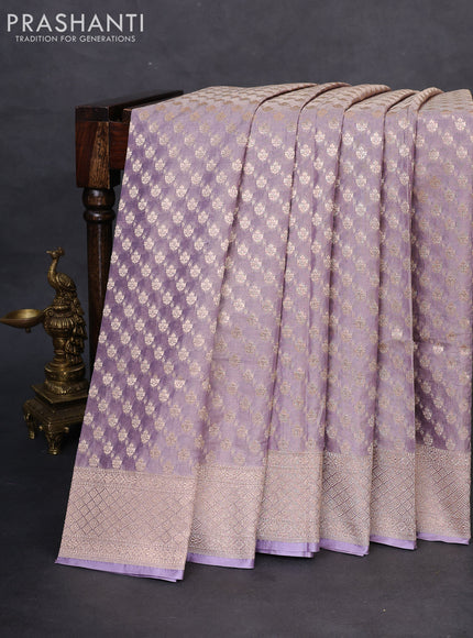 Banarasi tissue silk saree pastel lavender with allover zari woven brocade weaves and zari woven border