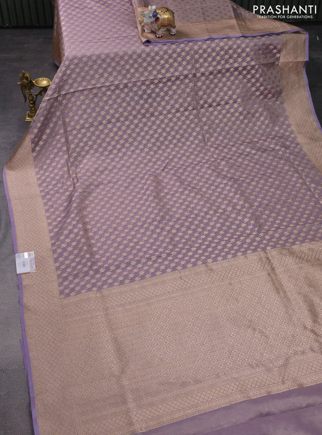 Banarasi tissue silk saree pastel lavender with allover zari woven brocade weaves and zari woven border