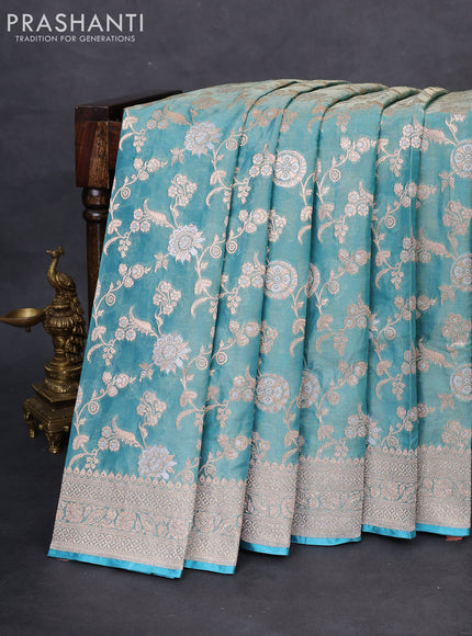 Banarasi tissue silk saree teal blue with allover silver & gold zari weaves and zari woven border