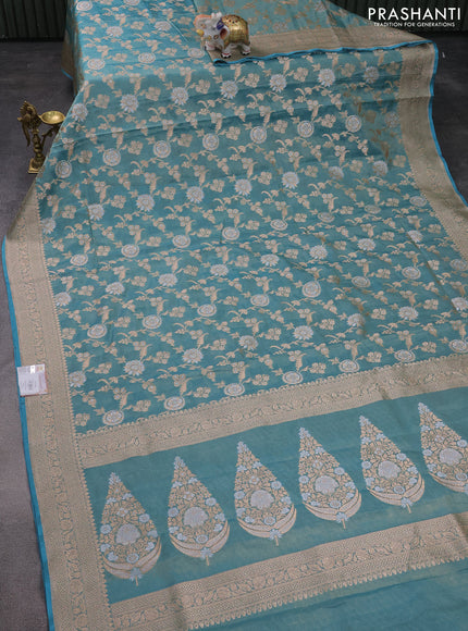 Banarasi tissue silk saree teal blue with allover silver & gold zari weaves and zari woven border