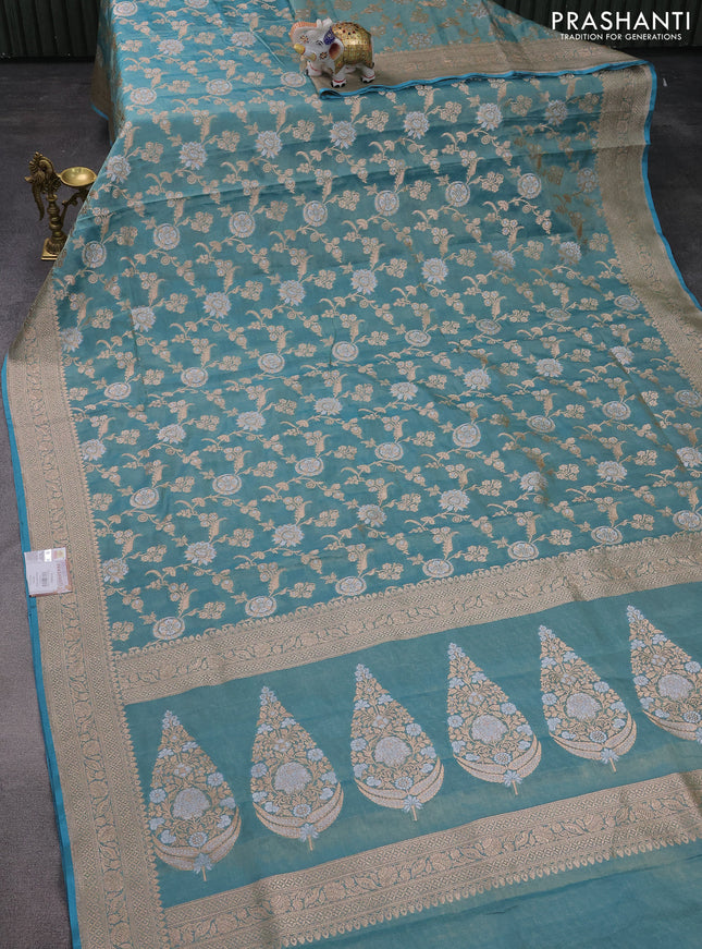 Banarasi tissue silk saree teal blue with allover silver & gold zari weaves and zari woven border
