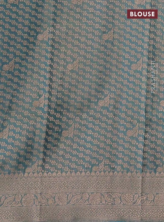 Banarasi tissue silk saree teal blue with allover silver & gold zari weaves and zari woven border