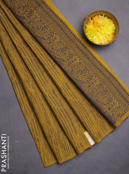 Banarasi semi matka saree mustard yellow with allover thread weaves in borderless style