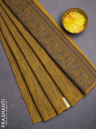Banarasi semi matka saree mustard yellow with allover thread weaves in borderless style