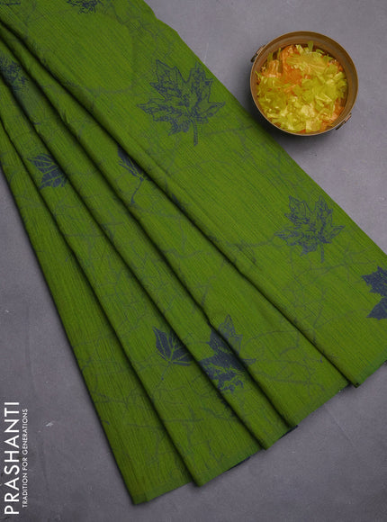 Banarasi semi matka saree light green with allover leaf thread woven buttas in borderless style