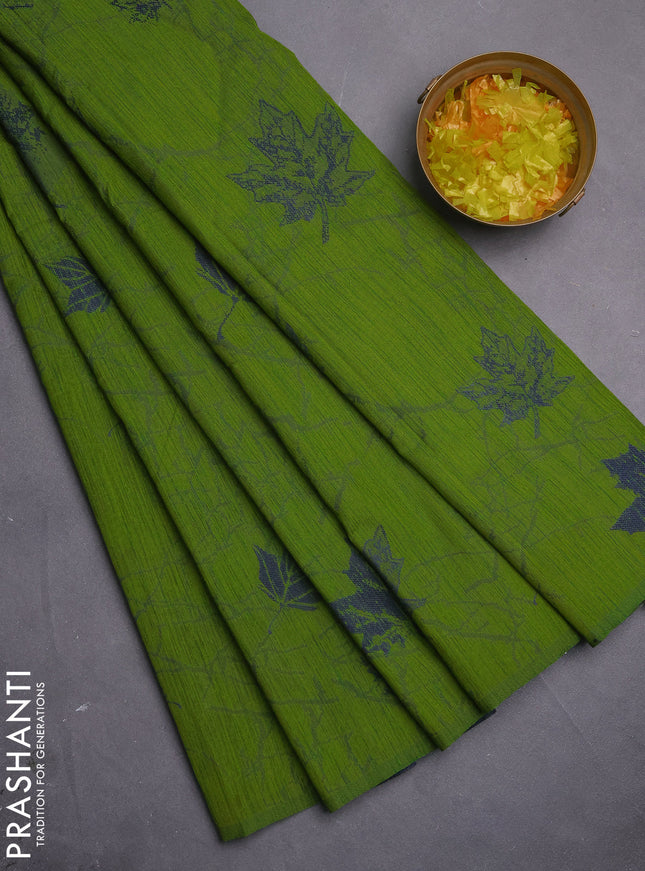 Banarasi semi matka saree light green with allover leaf thread woven buttas in borderless style